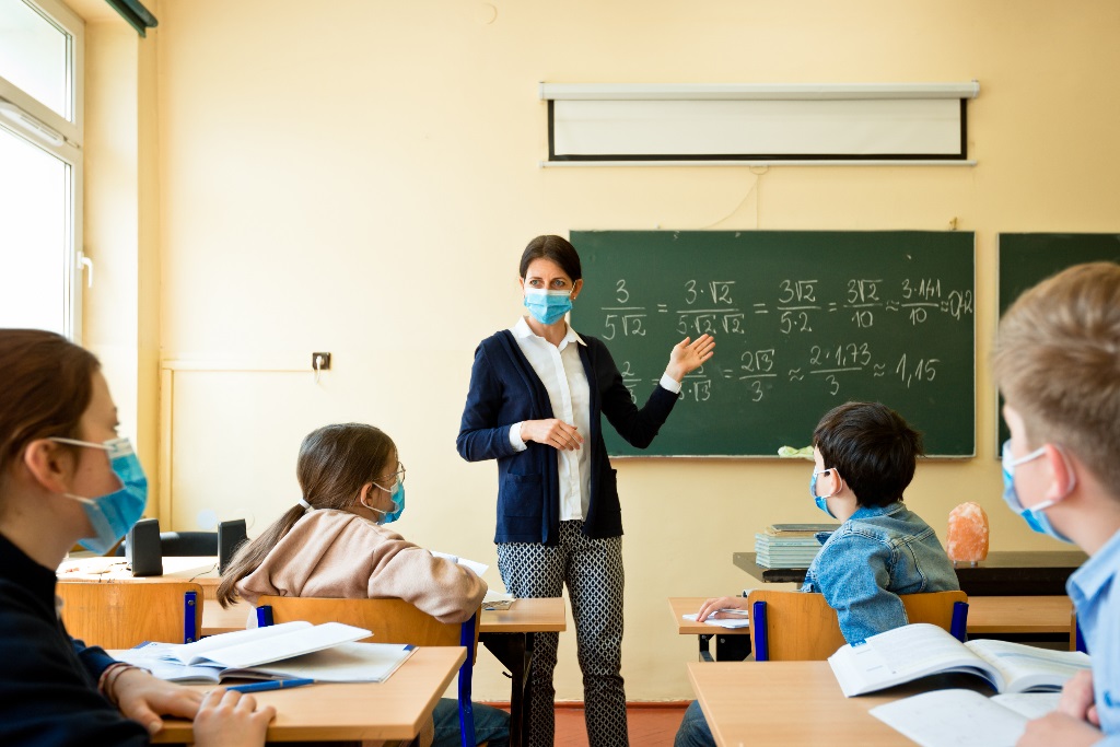 iStock-1225062688 - teacher teaching masks - 1024x768